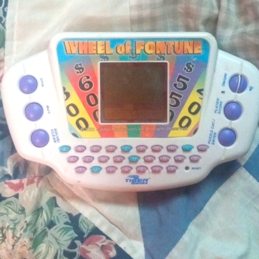 Vintage Wheel of Fortune Handheld Game